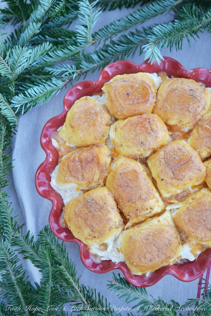 Hawaiian Meets Cajun Crab Dip Sliders - Hawaiian Meets Cajun Crab Dip Sliders are the perfect winter appetizer to warm you up from the inside. They're cheesy, melty, crab-stuffed little sandwiches served up on pillowy soft sweet Hawaiian slider rolls, with just the right amount of Cajun kick to keep you coming back for more.