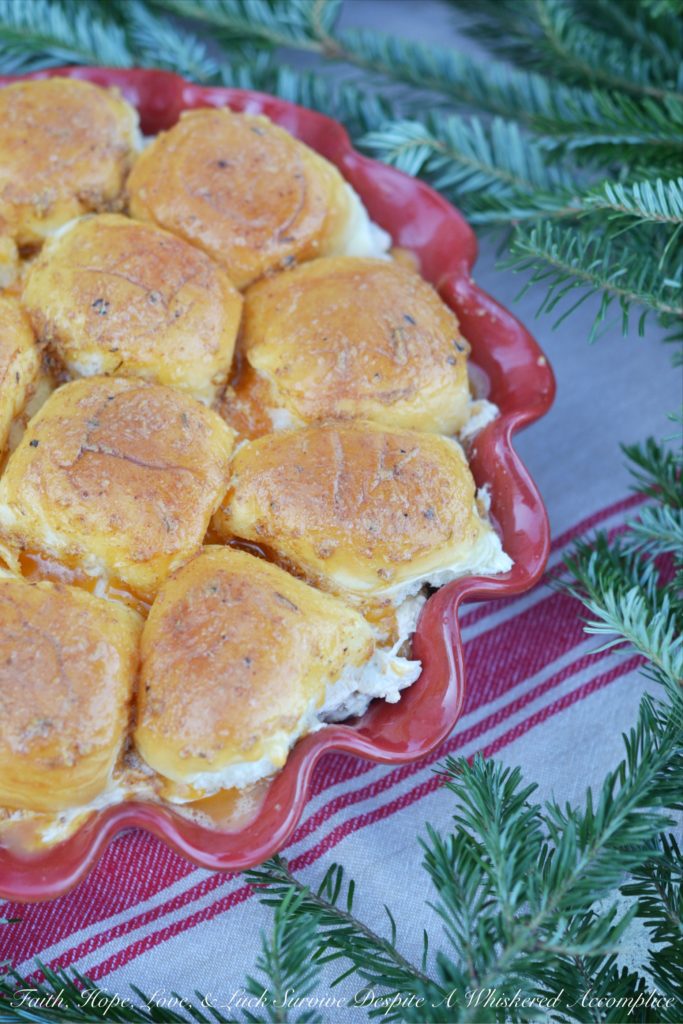 Hawaiian Meets Cajun Crab Dip Sliders - Hawaiian Meets Cajun Crab Dip Sliders are the perfect winter appetizer to warm you up from the inside. They're cheesy, melty, crab-stuffed little sandwiches served up on pillowy soft sweet Hawaiian slider rolls, with just the right amount of Cajun kick to keep you coming back for more.