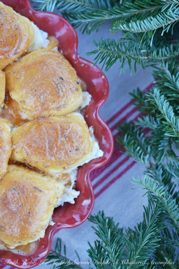 Hawaiian Meets Cajun Crab Dip Sliders - Hawaiian Meets Cajun Crab Dip Sliders are the perfect winter appetizer to warm you up from the inside. They're cheesy, melty, crab-stuffed little sandwiches served up on pillowy soft sweet Hawaiian slider rolls, with just the right amount of Cajun kick to keep you coming back for more.