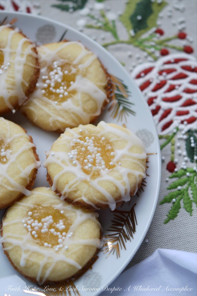 Malibu Winter Thumbprint Cookies - When the world outside is covered in snow and you can't seem to put on enough layers of clothes to stay warm, these cookies help you feel like an island escape is possible and that sunshine and warmth are only one cookie away.