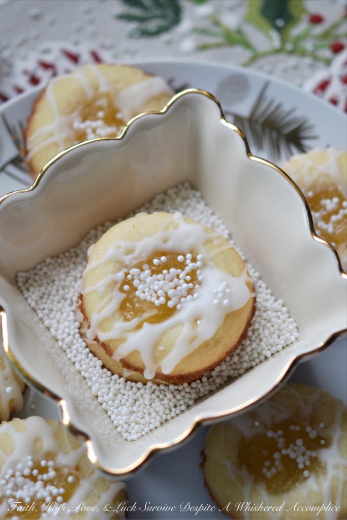 Malibu Winter Thumbprint Cookies - When the world outside is covered in snow and you can't seem to put on enough layers of clothes to stay warm, these cookies help you feel like an island escape is possible and that sunshine and warmth are only one cookie away.