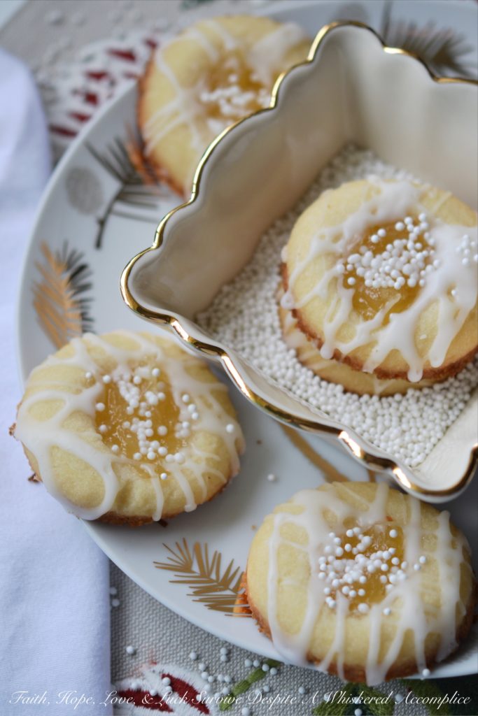 Malibu Winter Thumbprint Cookies - When the world outside is covered in snow and you can't seem to put on enough layers of clothes to stay warm, these cookies help you feel like an island escape is possible and that sunshine and warmth are only one cookie away.