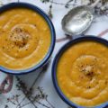 Cozy Winter Sweet Potato & Thyme Soup - This healthy winter soup recipe will leave you feeling cozy and satisfied, no matter how cold the weather is. And, as an added bonus, this creamy soup can be made differently each time with add-ons like cheese, sour cream, chives, bacon, or pumpkin seeds, which means that you can enjoy this soup for several days in a row without ever having to have it the same way twice.