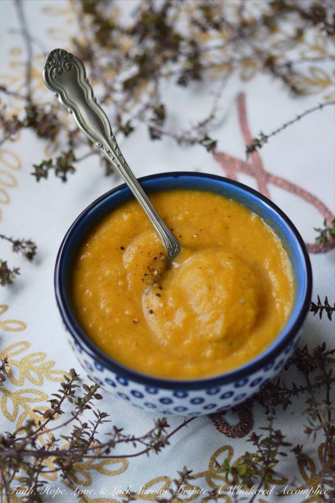 Cozy Winter Sweet Potato & Thyme Soup - This healthy winter soup recipe will leave you feeling cozy and satisfied, no matter how cold the weather is. And, as an added bonus, this creamy soup can be made differently each time with add-ons like cheese, sour cream, chives, bacon, or pumpkin seeds, which means that you can enjoy this soup for several days in a row without ever having to have it the same way twice.
