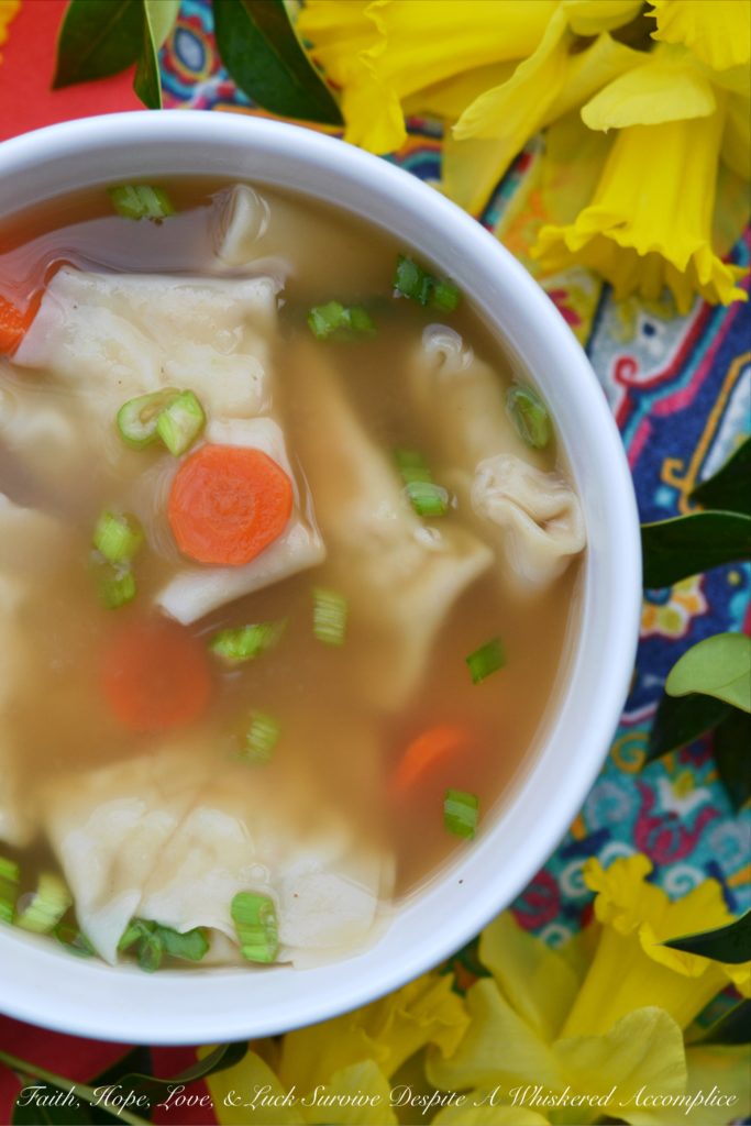 Shrimp Wonton Soup - Curling up with a big bowl of homemade soup is pretty much the definition of comfort. And this cozy, slurpable international Shrimp Wonton Soup, packed with plump, ground-shrimp-filled dumplings, provides all the comfort you could ever need. The broth is a little bit of a flavor adventure, with chicken stock, clam juice, and just enough soy sauce to make you wonder why you ever settled for takeout. Add in a handful of thinly sliced carrots and scallions for a pop of color and a sweet, fresh crunch, and you’ve got yourself a bowl of pure happiness. So, the next time you’re eyeing that Chinese takeout menu, just remember how much more delicious this homemade Shrimp Wonton Soup will be.