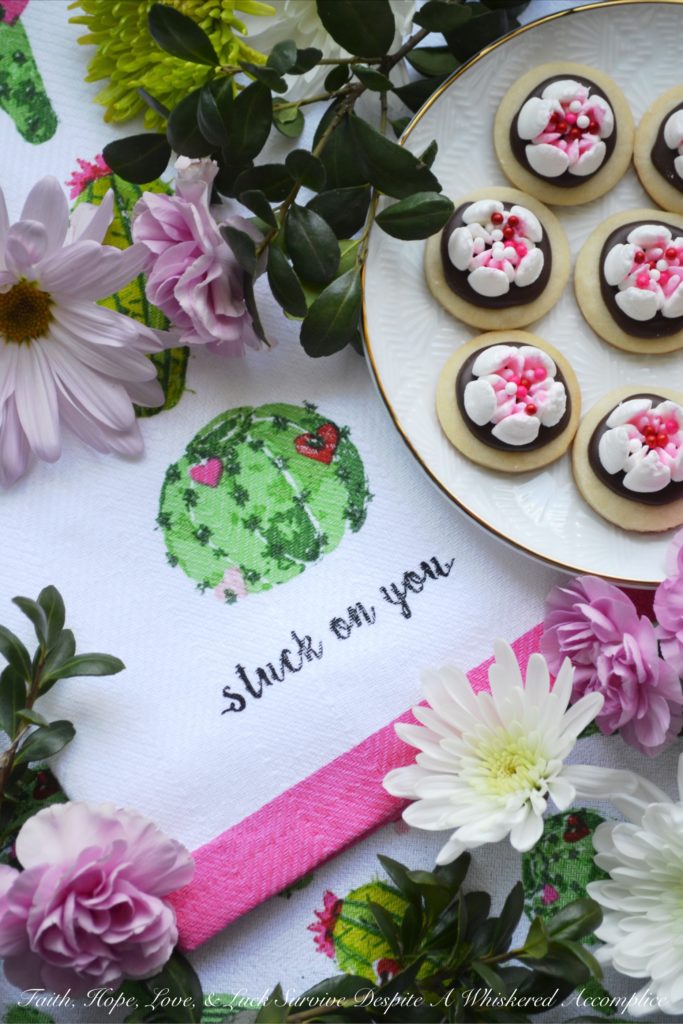 Chocolate Covered Russian Rose Shortbread - These gorgeous shortbread cookies are covered with melted dark chocolate and then decorated with beautiful handmade royal icing flowers, made using a Russian piping tip. For an easier-to-make version, you can forgo the royal icing flowers and decorate these miniature shortbread cookies with sprinkles, candy hearts, or any festive holiday candies.