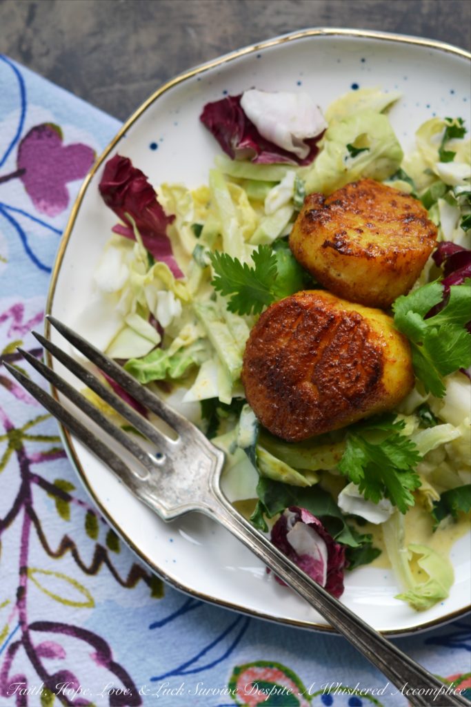 Scallop & Kale Salad with Yogurt Curry Dressing - This delightful appetizer salad will be the hit of your next dinner party with its subtle curry flavor and tangy salad dressing. The yogurt dressing is the perfect complement to the sautéed golden brown sweet curry scallops. If you're looking for an elegant, yet simple salad, this is definitely it.
