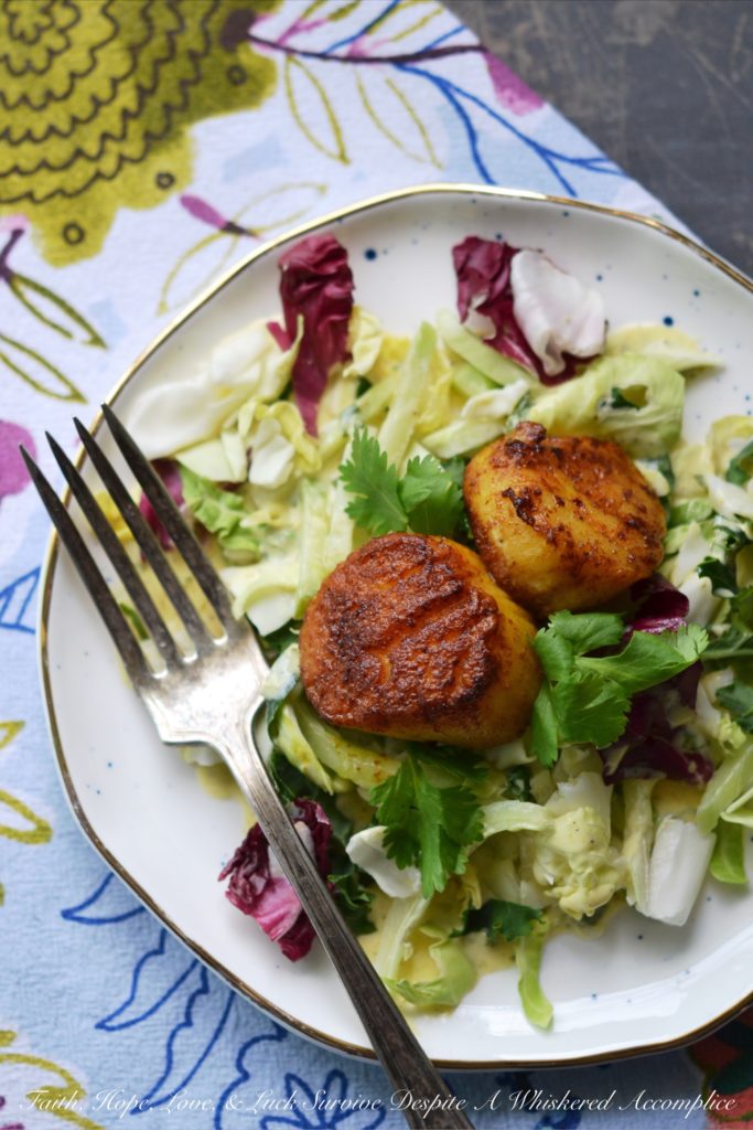 Scallop & Kale Salad with Yogurt Curry Dressing - This delightful appetizer salad will be the hit of your next dinner party with its subtle curry flavor and tangy salad dressing. The yogurt dressing is the perfect complement to the sautéed golden brown sweet curry scallops. If you're looking for an elegant, yet simple salad, this is definitely it.