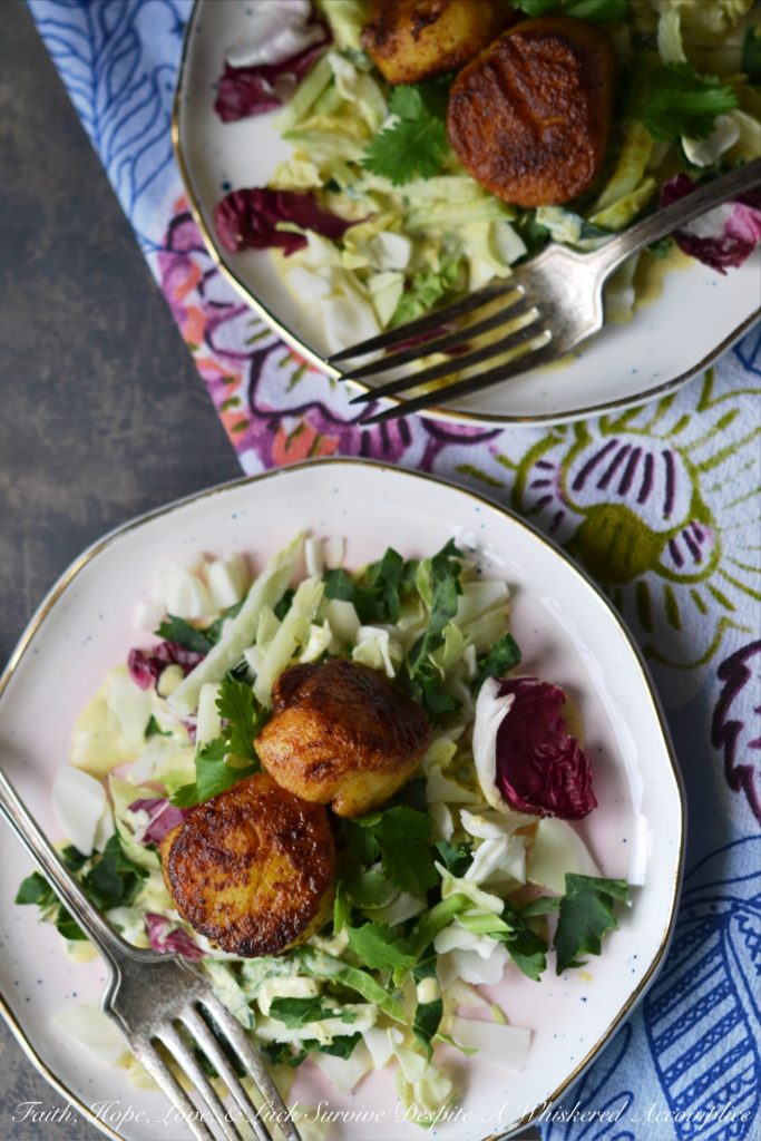 Scallop & Kale Salad with Yogurt Curry Dressing - This delightful appetizer salad will be the hit of your next dinner party with its subtle curry flavor and tangy salad dressing. The yogurt dressing is the perfect complement to the sautéed golden brown sweet curry scallops. If you're looking for an elegant, yet simple salad, this is definitely it.