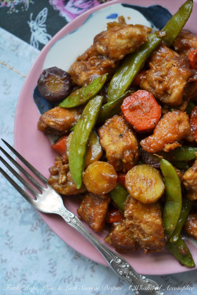 This simple crockpot Kung Pao Chicken meal has all the flavor of takeout Chinese food, only it's made with healthier ingredients and far less fat.