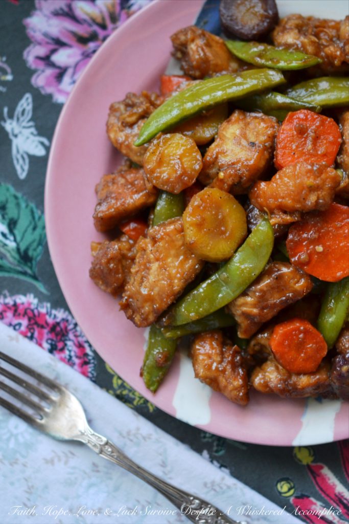 This simple crockpot Kung Pao Chicken meal has all the flavor of takeout Chinese food, only it's made with healthier ingredients and far less fat.