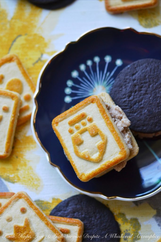 Frozen Peanut Butter & Jelly Cookie Sandwiches - All you need to make these frozen peanut butter and jelly cookie sandwiches are a few of your favorite homemade or store-bought cookies and some homemade peanut butter and jelly ice cream. And, since the ice cream only requires heavy whipping cream, peanut butter, and jelly, you'll be able to make these ice cream sandwiches whenever the mood strikes.