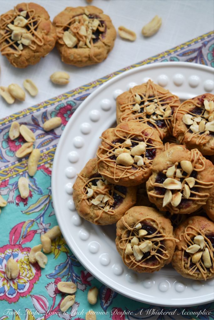 PB&J Banana Oatmeal Thumbprint Cookies - These flavorful thumbprint PB&J cookies are an instant favorite. Serve them for breakfast, as a snack, or even for dessert. With a perfect combination of crunchy, chewy, sweet, and salty, these peanut butter and jelly banana oatmeal thumbprint cookies are sure to be a hit with the whole family.
