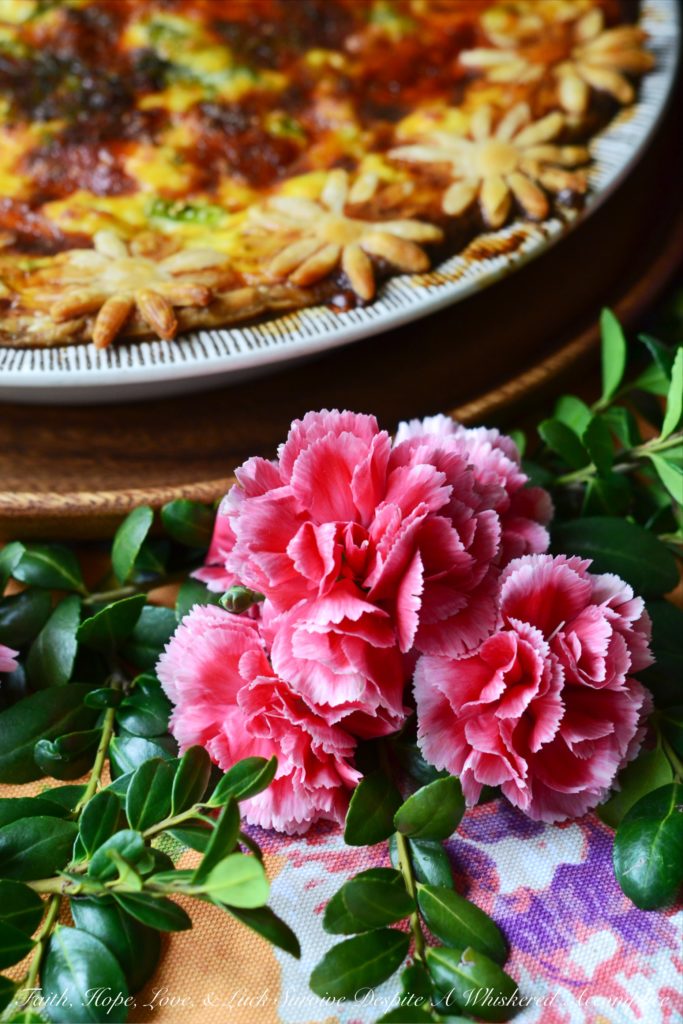 Spring Greens Quiche - Some dishes have a way of wrapping you in comfort, speaking straight to your heart, even if they never make the 'health food' hall of fame. Quiche is one of those irresistible classics, with its silky egg filling and golden, flaky crust. This Spring Greens Quiche is a celebration of the season, brimming with crisp asparagus, sweet leeks, and fragrant fennel, so every slice bursts with garden-fresh flavor. Nestle those vibrant Spring greens into a pie crust along with a rich egg custard and a generous layer of cheese, and suddenly eating your veggies feels like a treat.