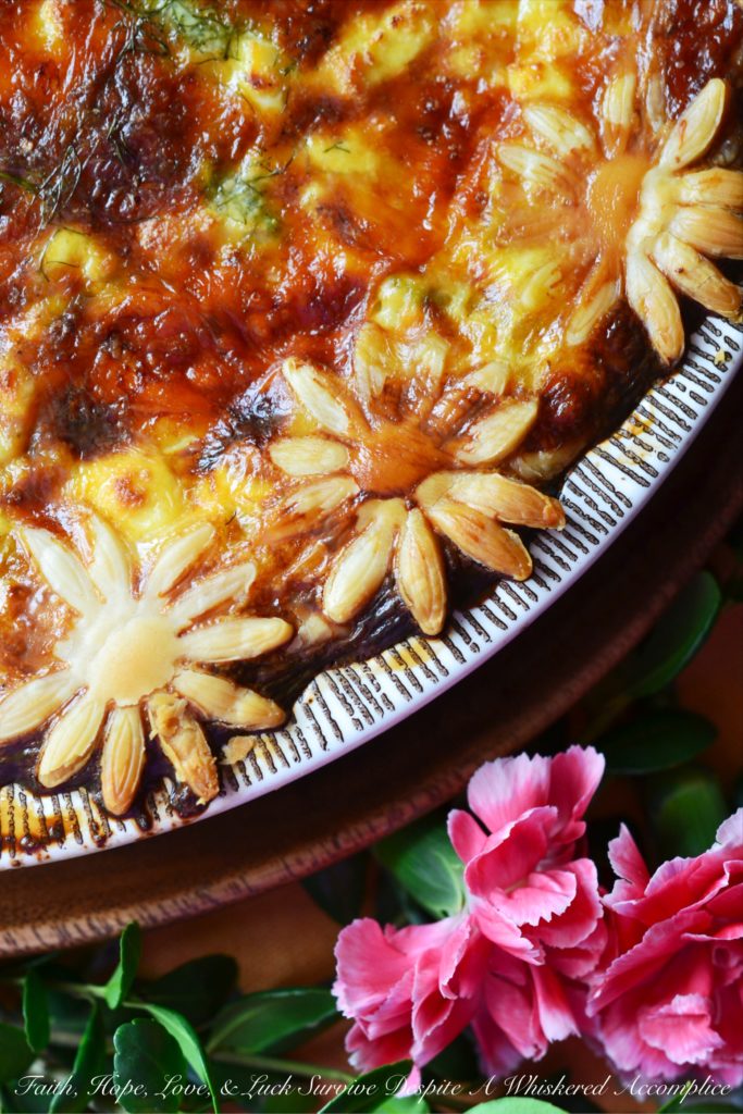 Spring Greens Quiche - Some dishes have a way of wrapping you in comfort, speaking straight to your heart, even if they never make the 'health food' hall of fame. Quiche is one of those irresistible classics, with its silky egg filling and golden, flaky crust. This Spring Greens Quiche is a celebration of the season, brimming with crisp asparagus, sweet leeks, and fragrant fennel, so every slice bursts with garden-fresh flavor. Nestle those vibrant Spring greens into a pie crust along with a rich egg custard and a generous layer of cheese, and suddenly eating your veggies feels like a treat.
