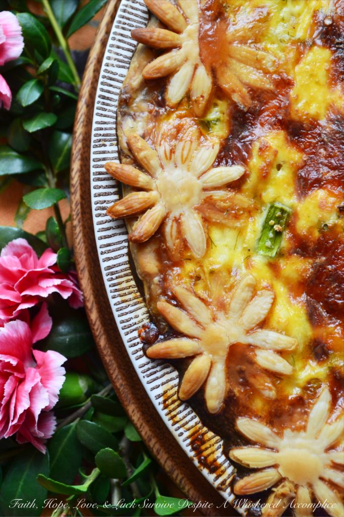 Spring Greens Quiche - Some dishes have a way of wrapping you in comfort, speaking straight to your heart, even if they never make the 'health food' hall of fame. Quiche is one of those irresistible classics, with its silky egg filling and golden, flaky crust. This Spring Greens Quiche is a celebration of the season, brimming with crisp asparagus, sweet leeks, and fragrant fennel, so every slice bursts with garden-fresh flavor. Nestle those vibrant Spring greens into a pie crust along with a rich egg custard and a generous layer of cheese, and suddenly eating your veggies feels like a treat.