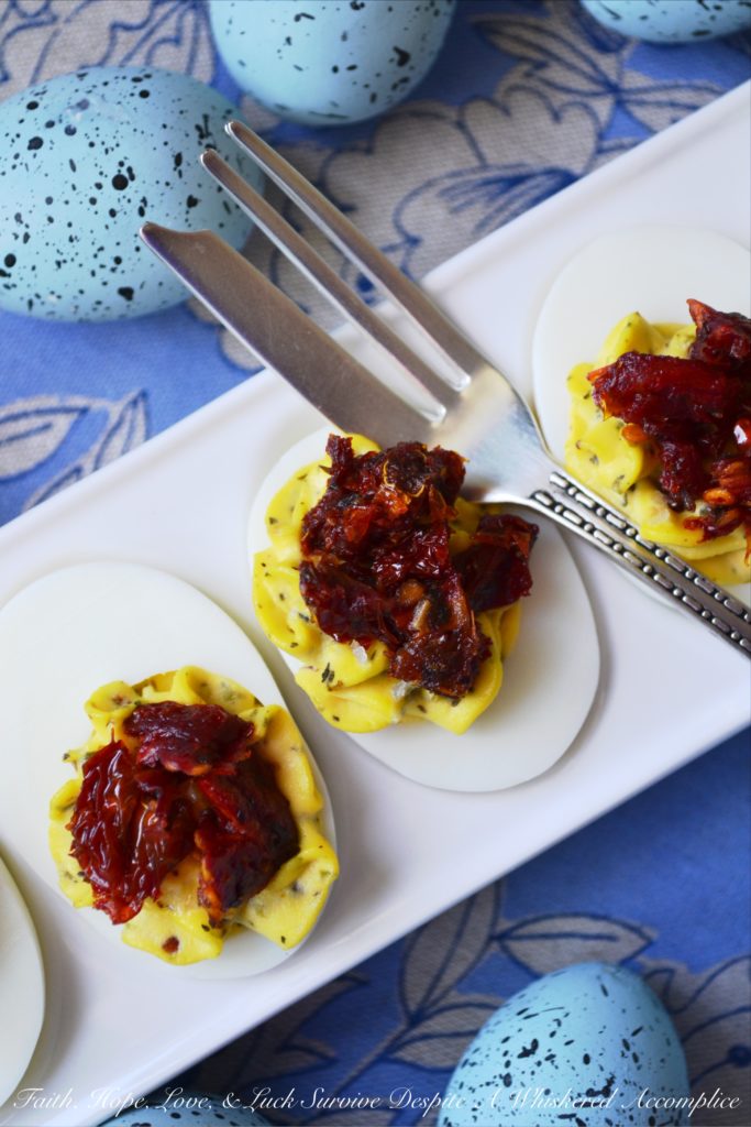 Simple Sun-Dried Tomato Deviled Eggs - This Easter, give your deviled eggs an Italian twist by adding Italian herb mix and garnishing them with sun-dried tomatoes.