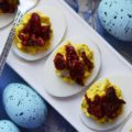 Simple Sun-Dried Tomato Deviled Eggs - This Easter, give your deviled eggs an Italian twist by adding Italian herb mix and garnishing them with sun-dried tomatoes.