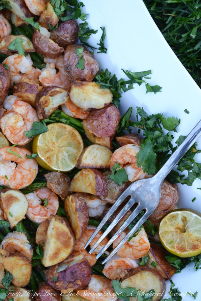Sheet Pan Chipotle Lime Shrimp Bake - Red potatoes, asparagus, broccolini, and shrimp transform into the perfect sheet pan meal with the addition of chipotle, lime juice, and melted butter. This seafood dinner is great for when you have company on a busy evening because it tastes amazing but takes very little effort to throw together. You can use asparagus, broccolini, or a mix of the two. It’s all about what's available for a decent price.
