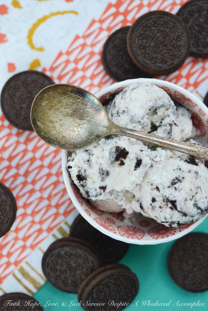 Garden Mint Cookies and Cream Ice Cream - This delicious cookies and cream ice cream is perfect for cooling down in the summertime. Fresh garden mint and crushed chocolate sandwich cookies come together in this ice cream to create the most amazing creamy and super minty frozen summer treat.