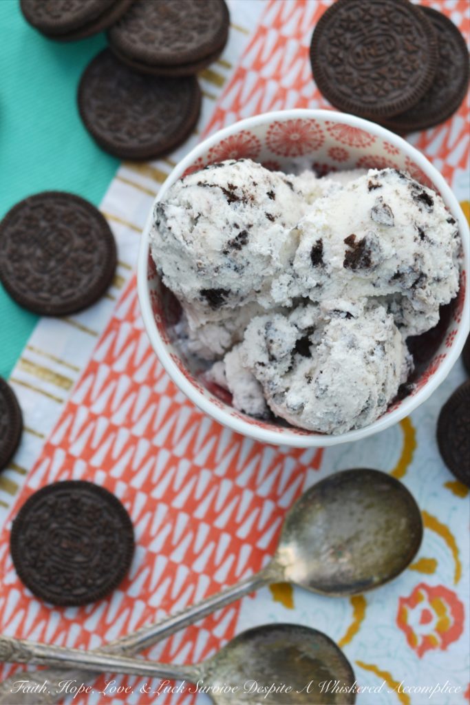 Garden Mint Cookies and Cream Ice Cream - This delicious cookies and cream ice cream is perfect for cooling down in the summertime. Fresh garden mint and crushed chocolate sandwich cookies come together in this ice cream to create the most amazing creamy and super minty frozen summer treat.