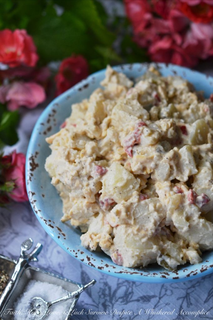Pimento Cheese & Dill Pickle Potato Salad - Pimento cheese and dill pickles make this potato salad a summer side dish worthy of any picnic, cookout, or family reunion. It's a super-tasty combination everyone you know is sure to fall in love with and gobble up right away.