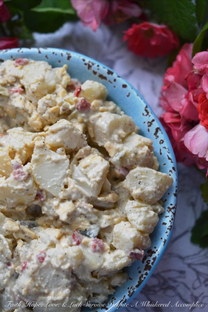 Pimento Cheese & Dill Pickle Potato Salad - Pimento cheese and dill pickles make this potato salad a summer side dish worthy of any picnic, cookout, or family reunion. It's a super-tasty combination everyone you know is sure to fall in love with and gobble up right away.