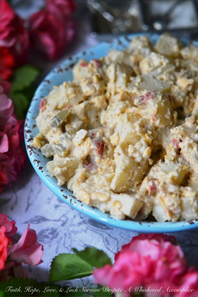 Pimento Cheese & Dill Pickle Potato Salad - Pimento cheese and dill pickles make this potato salad a summer side dish worthy of any picnic, cookout, or family reunion. It's a super-tasty combination everyone you know is sure to fall in love with and gobble up right away.