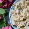 Pimento Cheese & Dill Pickle Potato Salad - Pimento cheese and dill pickles make this potato salad a summer side dish worthy of any picnic, cookout, or family reunion. It's a super-tasty combination everyone you know is sure to fall in love with and gobble up right away.