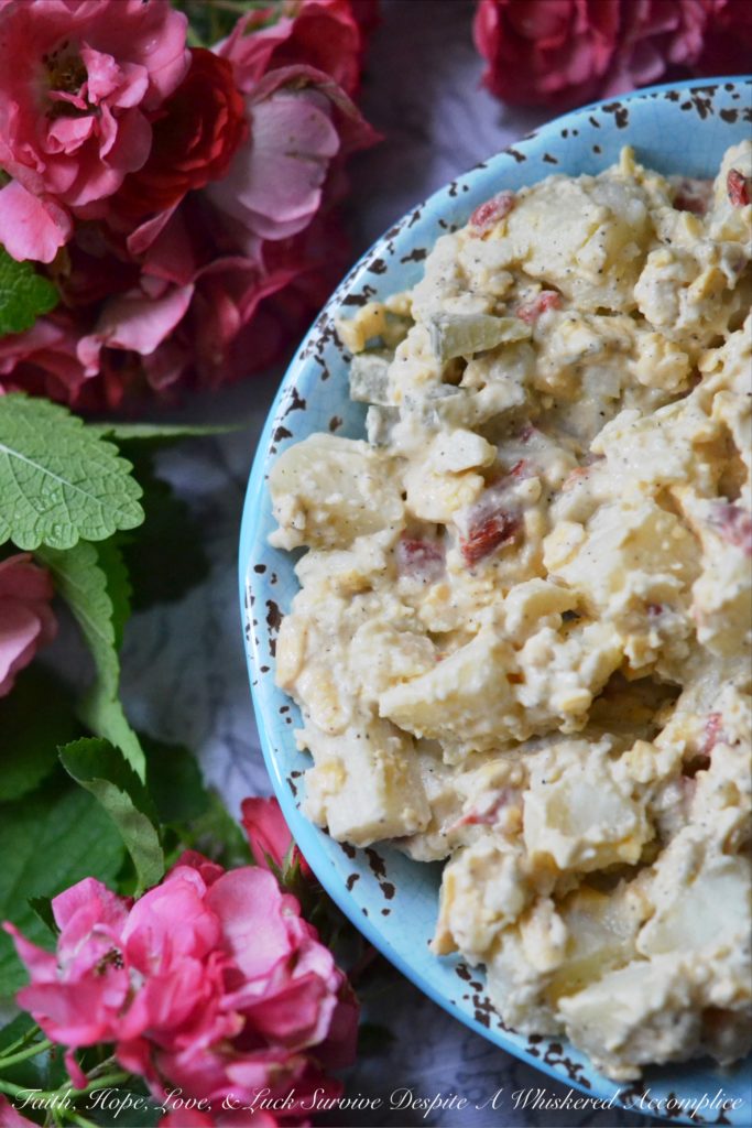 Pimento Cheese & Dill Pickle Potato Salad - Pimento cheese and dill pickles make this potato salad a summer side dish worthy of any picnic, cookout, or family reunion. It's a super-tasty combination everyone you know is sure to fall in love with and gobble up right away.