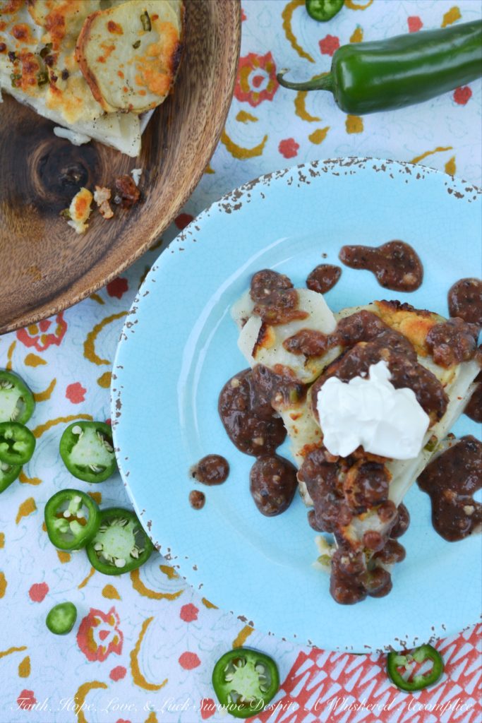 Jalapeño & Cotija Cheese Potato Stack Pie - Pie isn't just for dessert anymore. Stacking thinly sliced potatoes with layers of minced jalapeños and crumbled cotija cheese, to make a potato stack pie, helps turn ordinary spuds into something truly spectacular, especially when served with salsa and sour cream.
