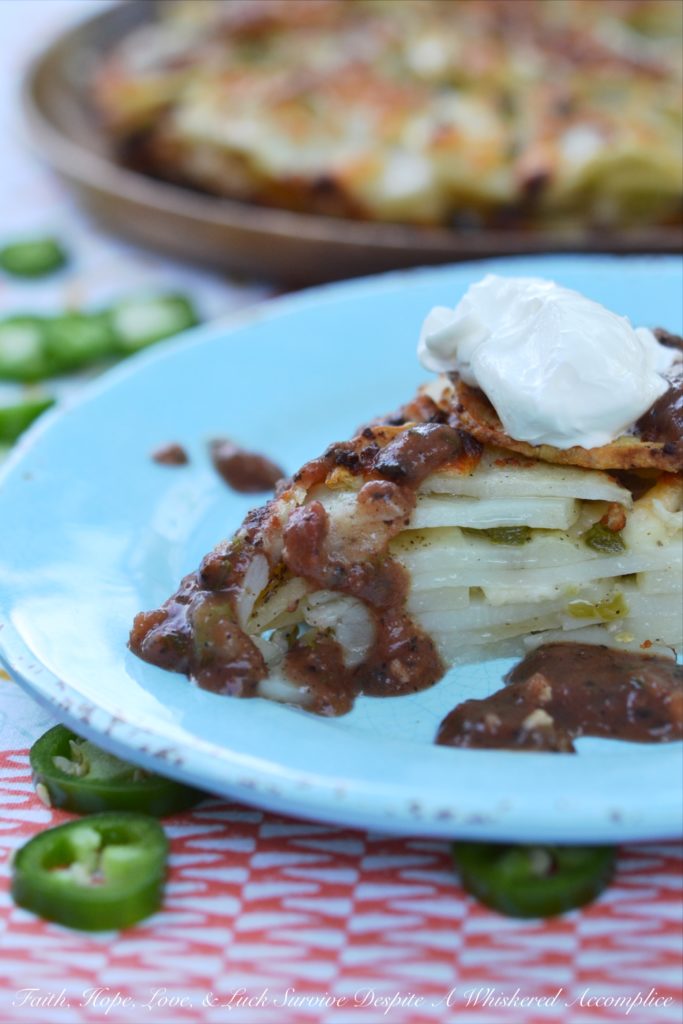 Jalapeño & Cotija Cheese Potato Stack Pie - Pie isn't just for dessert anymore. Stacking thinly sliced potatoes with layers of minced jalapeños and crumbled cotija cheese, to make a potato stack pie, helps turn ordinary spuds into something truly spectacular, especially when served with salsa and sour cream.