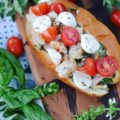 Summer Caprese Shrimp Salad Roll - Shrimp, ripe tomatoes, basil, and fresh mozzarella come together with just a hint of mayonnaise to make the most delicious shrimp roll you've ever tasted.