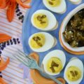 Sweet & Spicy Candied Jalapeño Deviled Eggs - These amazing deviled eggs are a little bit sweet and a little bit spicy, thanks to the addition of finely chopped candied sliced jalapeños. And, whether or not you make your own candied jalapeño slices or buy them from your local market, these eggs will definitely make a great addition to your next cookout, picnic, or family gathering.