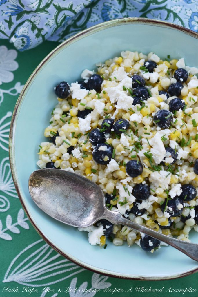 White Balsamic Blueberry, Corn, and Feta Salad - Fresh corn, plump blueberries, and feta cheese come together to make the perfect summer salad when combined with a white balsamic dressing.