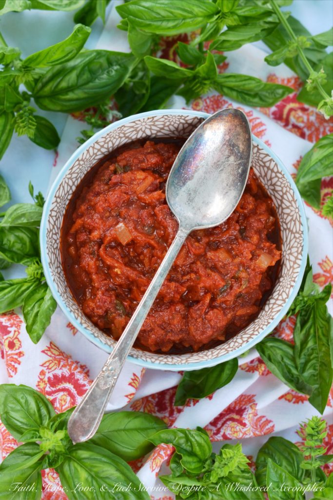 Crushed Tomato Sauce with Sun-Dried Tomatoes - Canned crushed tomatoes, fresh basil, and sun-dried tomatoes help make this homemade tomato sauce taste like it almost came straight out of the garden.