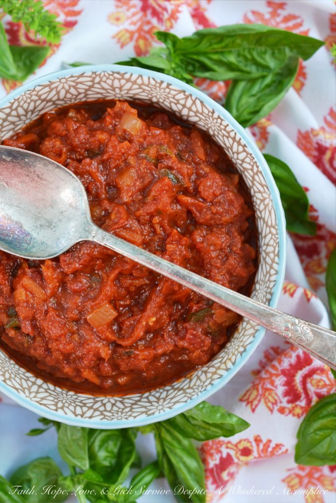 Crushed Tomato Sauce with Sun-Dried Tomatoes - Canned crushed tomatoes, fresh basil, and sun-dried tomatoes help make this homemade tomato sauce taste like it almost came straight out of the garden.