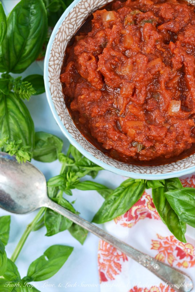 Crushed Tomato Sauce with Sun-Dried Tomatoes - Canned crushed tomatoes, fresh basil, and sun-dried tomatoes help make this homemade tomato sauce taste like it almost came straight out of the garden.