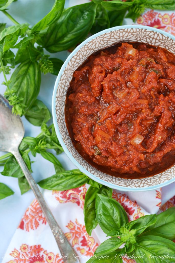 Crushed Tomato Sauce with Sun-Dried Tomatoes - Canned crushed tomatoes, fresh basil, and sun-dried tomatoes help make this homemade tomato sauce taste like it almost came straight out of the garden.