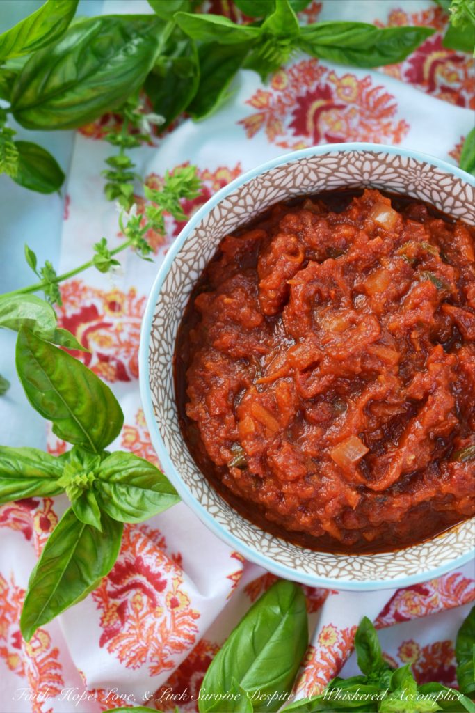 Crushed Tomato Sauce with Sun-Dried Tomatoes - Canned crushed tomatoes, fresh basil, and sun-dried tomatoes help make this homemade tomato sauce taste like it almost came straight out of the garden.
