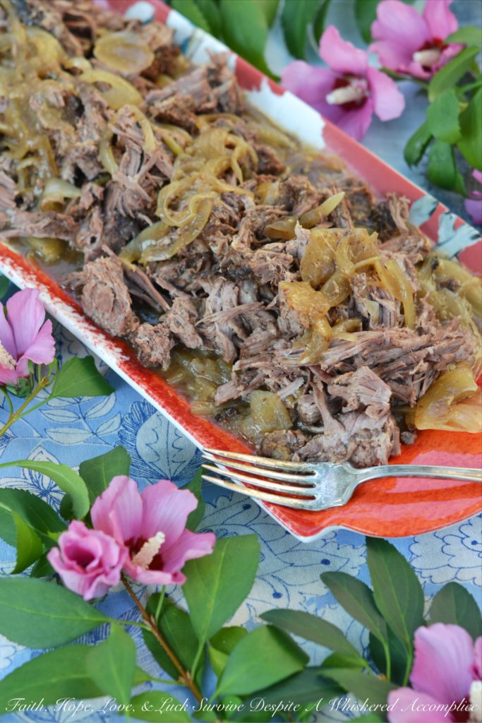 Green Chile Enchilada Crockpot Texas Roast - It's amazing how much flavor a can of green chile enchilada sauce can add to a dish. This Tex-Mex-inspired pulled beef roast is tender, slightly spicy, juicy, and delicious whether it's served over mashed potatoes or rice. If you're a huge taco fan, this shredded beef can also be used to make the most amazing soft tacos.