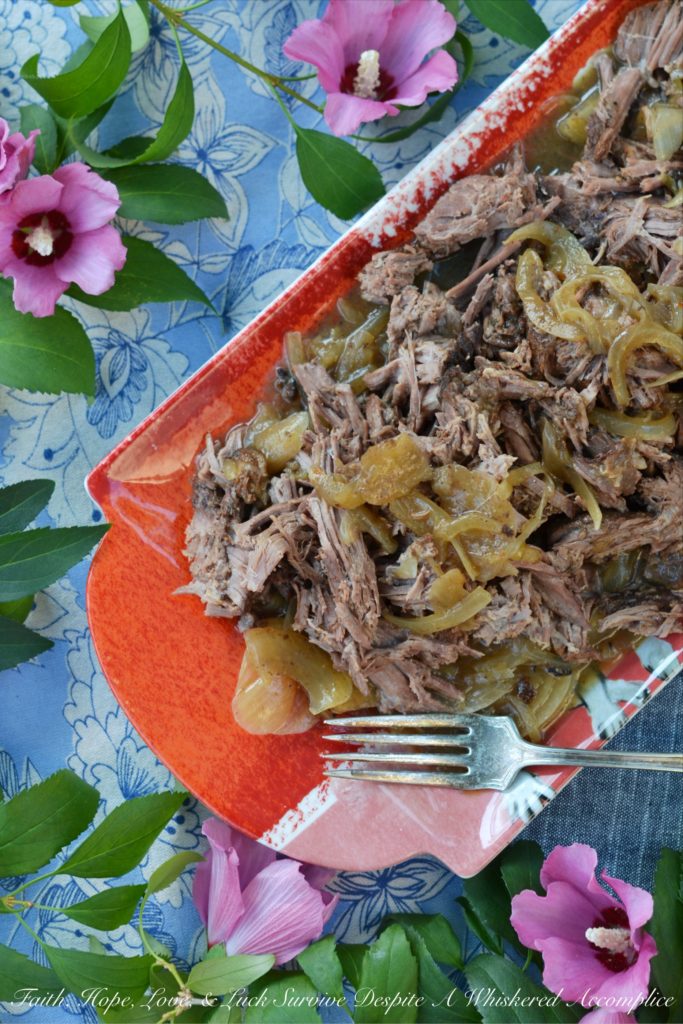 A mouthwatering crockpot roast rubbed with Texas seasoning and then slowly cooked in green chile enchilada sauce until tender and flavorful.