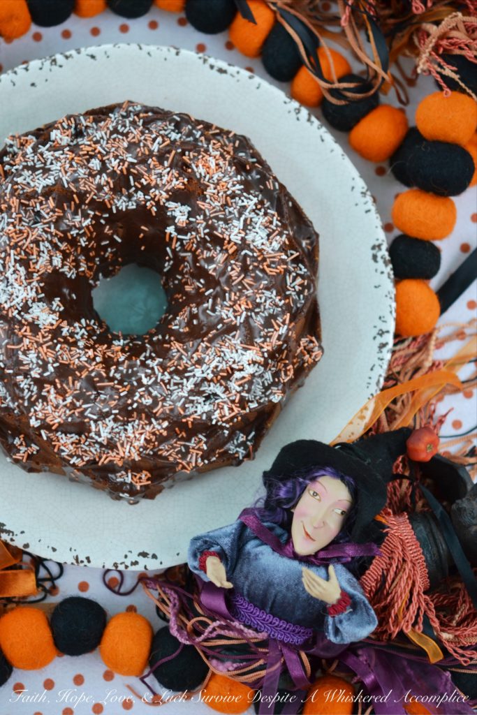 Creamsicle Bundt Cake with Orange Cocoa Glaze - Orange cream soda helps to make this Bundt cake moist and delicious while adding just the right hint of flavor to the cocoa glaze drizzled on top of it.