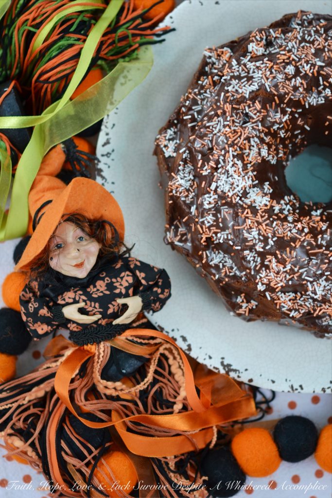 Creamsicle Bundt Cake with Orange Cocoa Glaze - Orange cream soda helps to make this Bundt cake moist and delicious while adding just the right hint of flavor to the cocoa glaze drizzled on top of it.