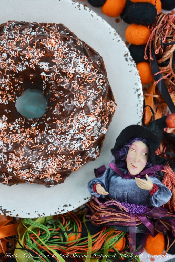 Creamsicle Bundt Cake with Orange Cocoa Glaze - Orange cream soda helps to make this Bundt cake moist and delicious while adding just the right hint of flavor to the cocoa glaze drizzled on top of it.
