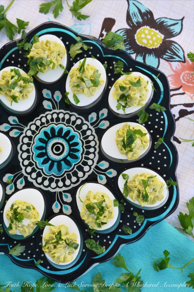 Egg Salad Deviled Eggs with Fresh Parsley - Having a hard time deciding whether or not you should make egg salad or deviled eggs? Why choose, when you can have the best of both worlds with these egg salad deviled eggs? They're super-creamy and full of delicious flavor, with a little bit of fresh parsley to brighten them up and add a lovely pop of color.