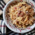 Sweet Cranberry Slow Cooker Sauerkraut - Imagine sauerkraut all dressed up in its holiday best, simmering away in a slow cooker with beer, maple syrup, brown sugar, and dried cranberries.