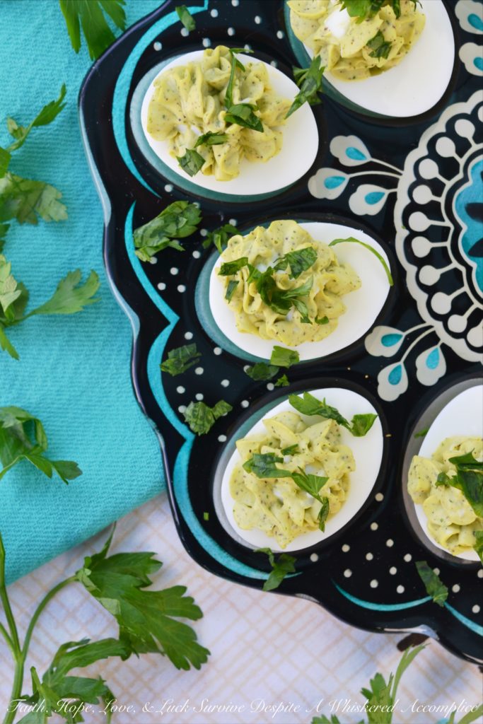 Egg Salad Deviled Eggs with Fresh Parsley - Having a hard time deciding whether or not you should make egg salad or deviled eggs? Why choose, when you can have the best of both worlds with these egg salad deviled eggs? They're super-creamy and full of delicious flavor, with a little bit of fresh parsley to brighten them up and add a lovely pop of color.