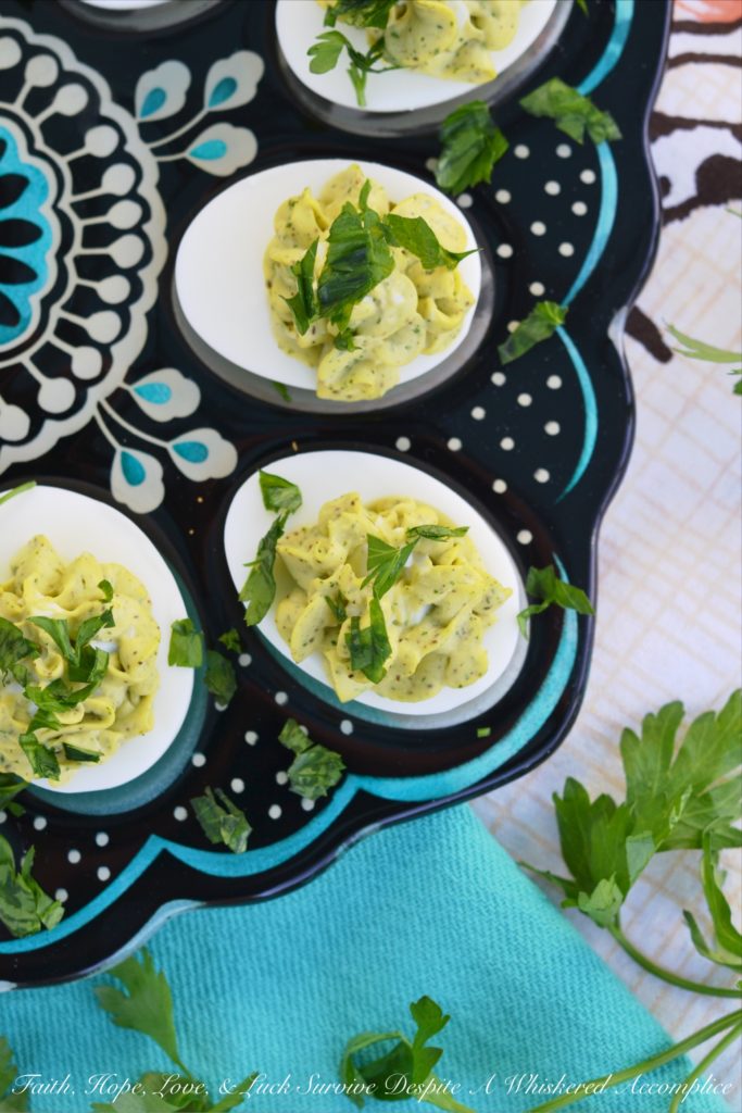 Egg Salad Deviled Eggs with Fresh Parsley - Having a hard time deciding whether or not you should make egg salad or deviled eggs? Why choose, when you can have the best of both worlds with these egg salad deviled eggs? They're super-creamy and full of delicious flavor, with a little bit of fresh parsley to brighten them up and add a lovely pop of color.