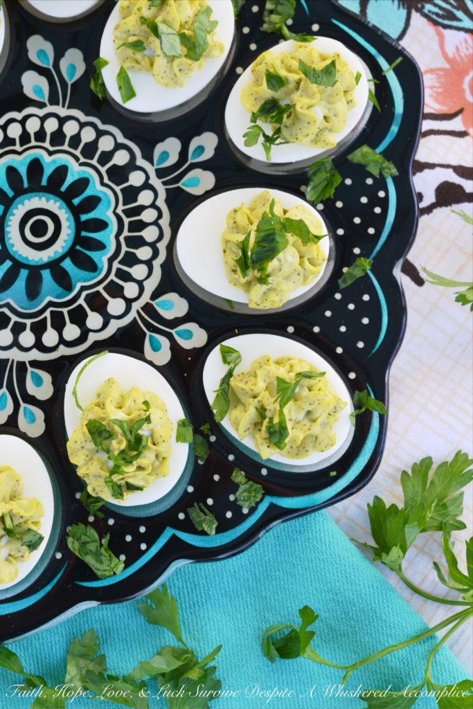 Egg Salad Deviled Eggs with Fresh Parsley - Having a hard time deciding whether or not you should make egg salad or deviled eggs? Why choose, when you can have the best of both worlds with these egg salad deviled eggs? They're super-creamy and full of delicious flavor, with a little bit of fresh parsley to brighten them up and add a lovely pop of color.
